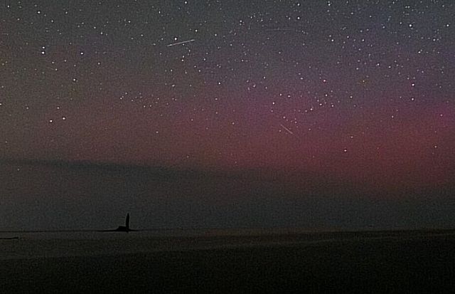 Are Faint Red Auroras Seen Over Japan Hiding Space Storms?